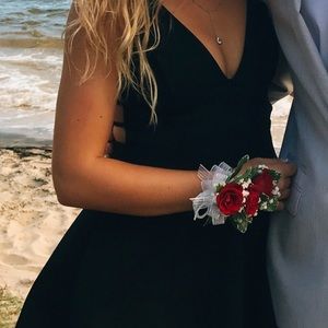 Black homecoming low cut flowy dress